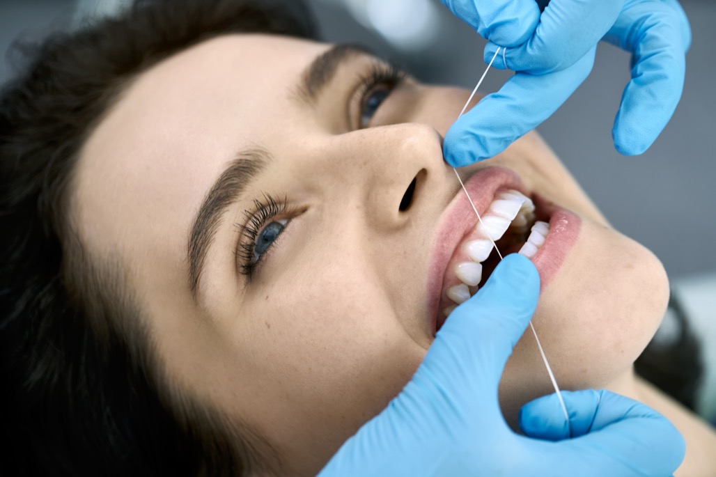 Charming,Girl,In,A,Dental,Clinic.,Dentist,In,Blue,Latex