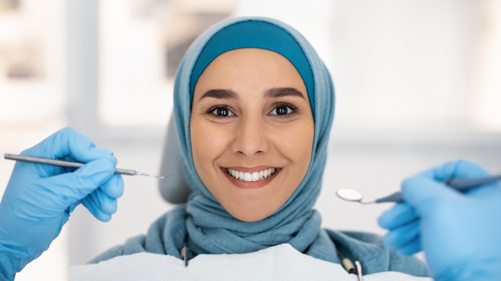 Cosmetic,Dentistry.,Smiling,Islamic,Lady,In,Hijab,Posing,During,Check